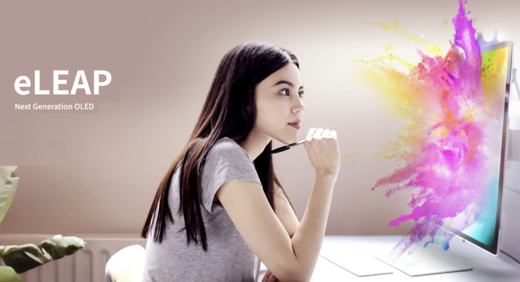 Close-up of a vibrant OLED screen powered by eLEAP technology, displaying rich colors and deep contrast, with futuristic tech elements in the background.